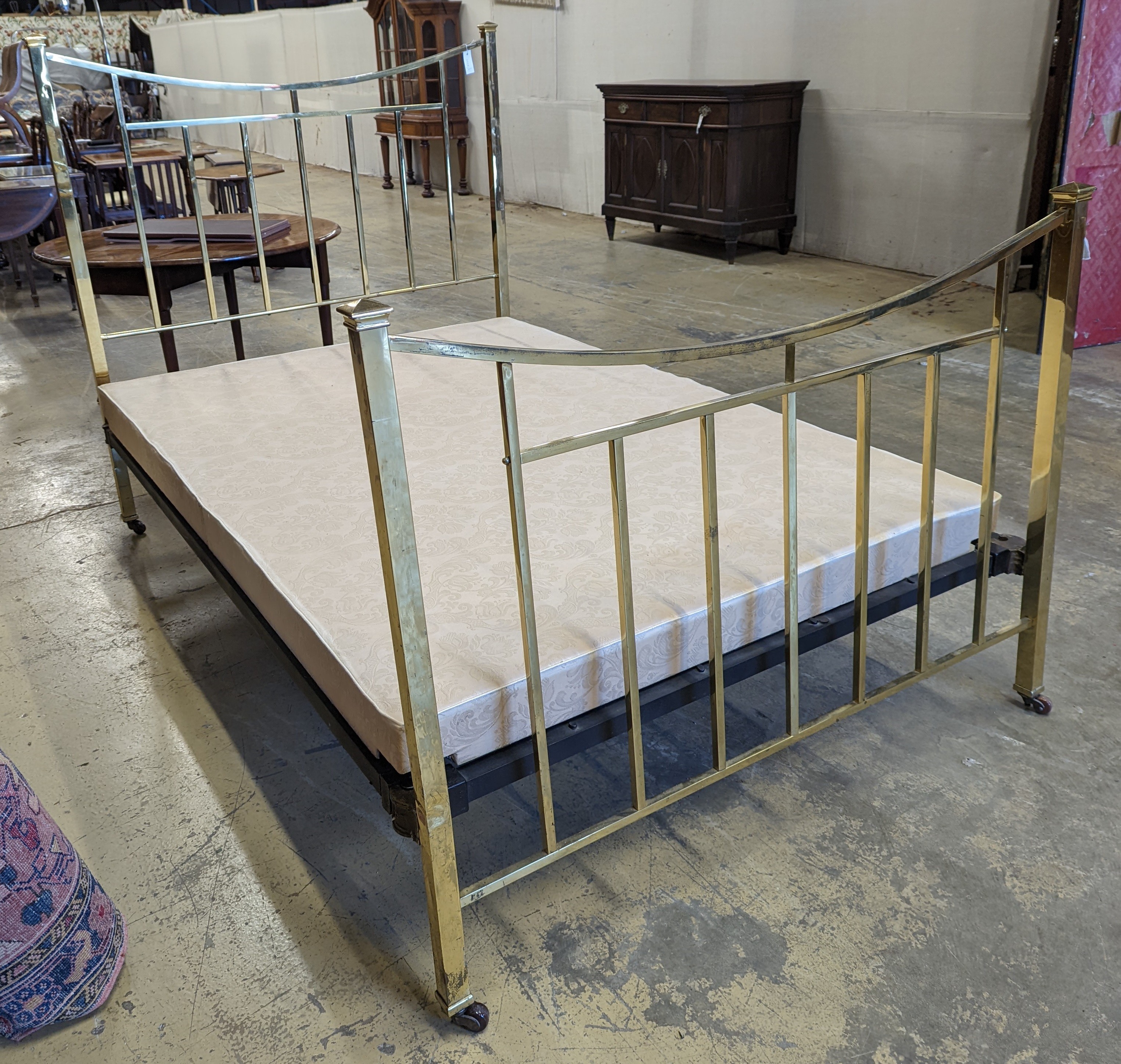 An Edwardian brass double bed frame, length 212cm, width 140cm